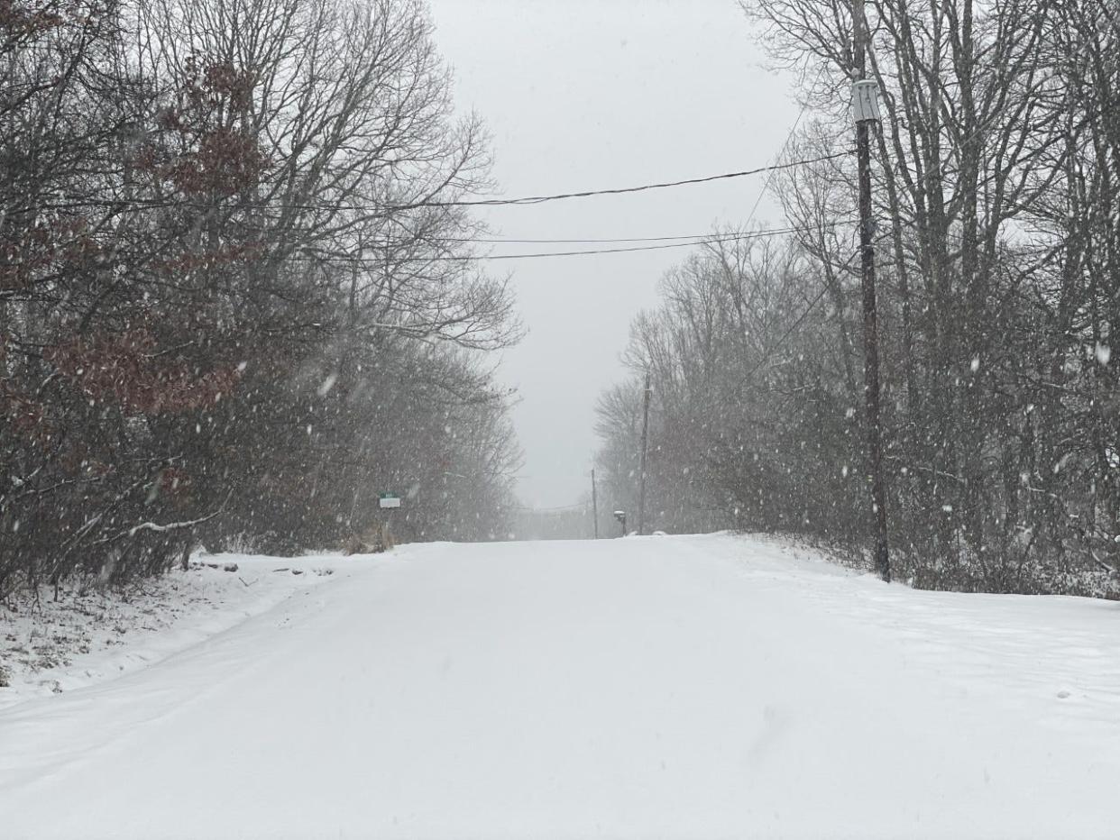 A roadway in Pocono Summit blanketed with snow on the afternoon of Thursday, Dec. 15, 2022.
