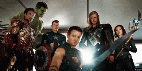 A gif of the titular Avengers staring at Loki as Hawkeye raises his bow.