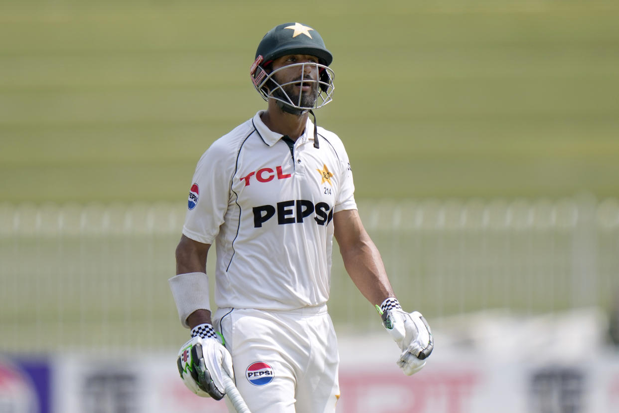 Pakistan's Shan Masood reacts as he walks off the field after his dismissal during the fourth day of second test cricket match between Pakistan and Bangladesh, in Rawalpindi, Pakistan, Monday, Sept. 2, 2024. (AP Photo/Anjum Naveed)