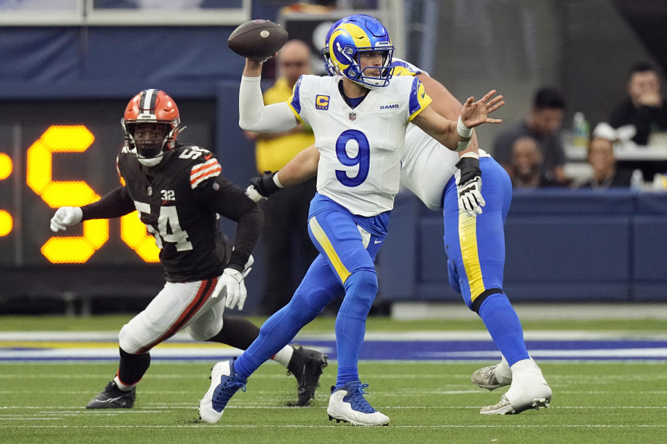 Los Angeles Rams quarterback Matthew Stafford (9) throws on the run against the Cleveland Browns during the first half of an NFL football game Sunday, Dec. 3, 2023, in Inglewood, Calif. (AP Photo/Mark J. Terrill)