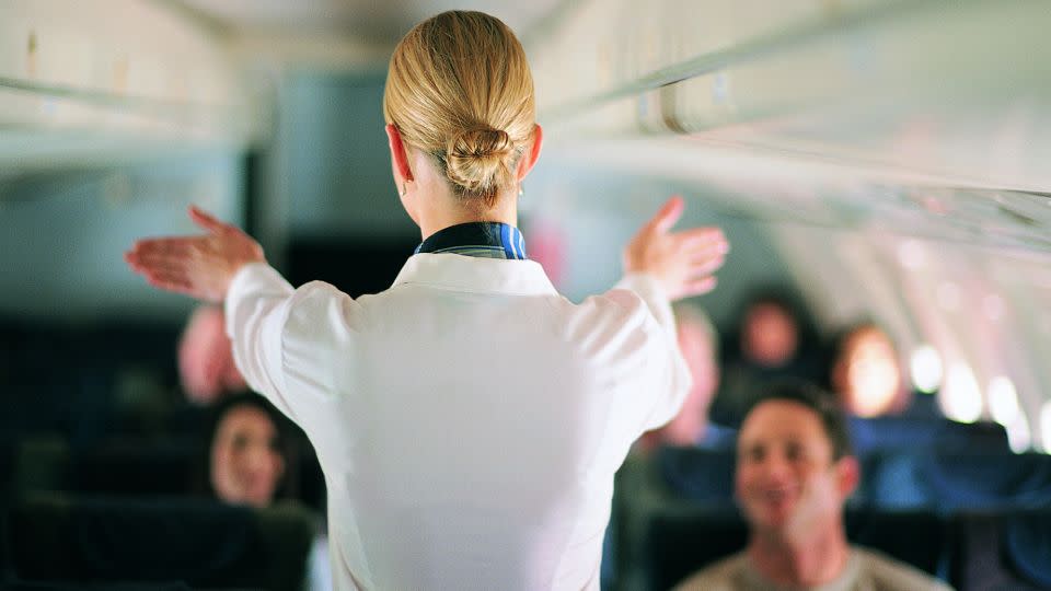 Flight attendants aren't just on board servers, they're responsible for passenger safety. - James Lauritz/Digital Vision/Getty Images