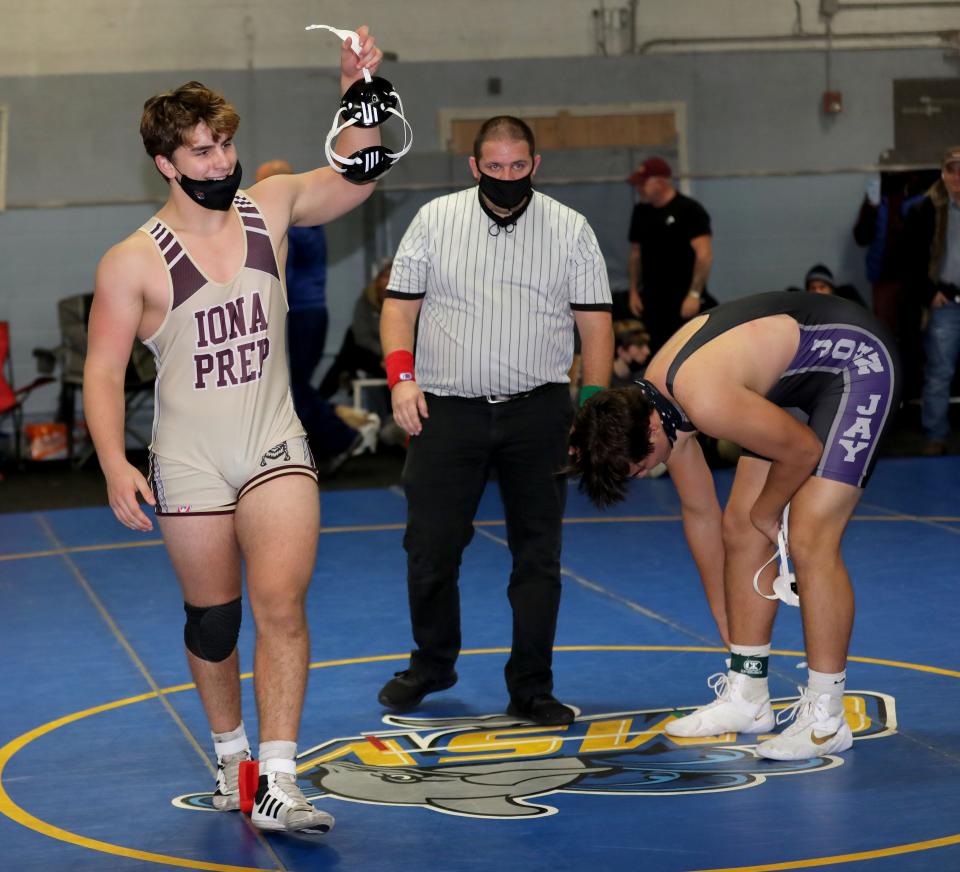 Iona Prep's Gabriel Garibaldi beat Harrison Brown from John Jay-Cross River during the Anthony Tortora Sr. Duals tournament at the Somers Sports Arena in Somers on Dec. 4, 2021.