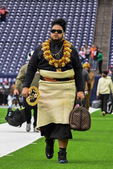 Cleveland Browns defensive tackle Siaki Ika arrives prior to an NFL wild-card playoff football game, Saturday, Jan 13, 2024, in Houston. (AP Photo/Maria Lysaker)