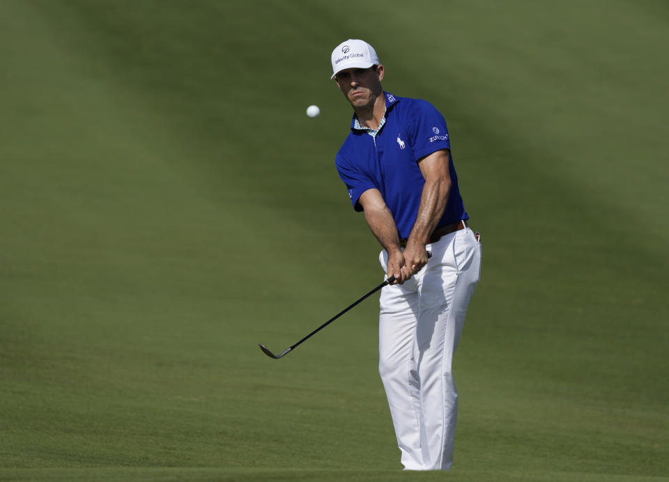 Billy Horschel, of the United States, chips onto the first green during the third round of the Hero World Challenge PGA Tour at the Albany Golf Club, in New Providence, Bahamas, Saturday, Dec. 3, 2022. (AP Photo/Fernando Llano)