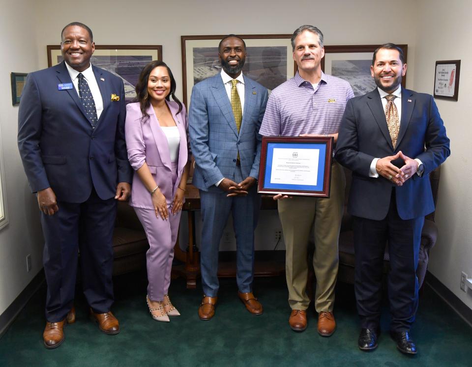 Rentech Boiler Systems received an SBA Legacy award Tuesday from the U.S. Small Business Administration. Pictured is Calvin Davis, district director for the SBA (left), Janea Jamison, regional advocate for SBA’s Region 16, Ted James, SBA regional administrator, Rentech President Mark Colman and Mark Madrid, associate administrator for the SBA.