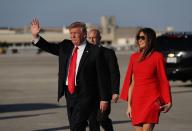 <p>Melania wore red on the tarmac for the first of many visits to Palm Beach. </p>