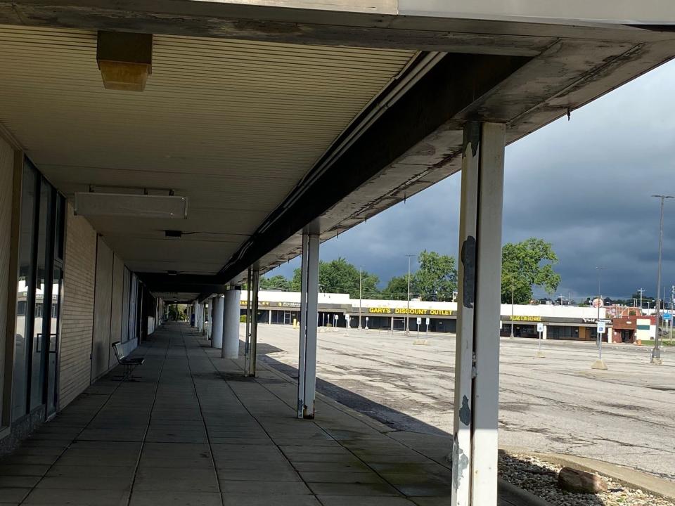 This is a view of the dilapidated, vacant portion of West Park Shopping Center to be demolished.
