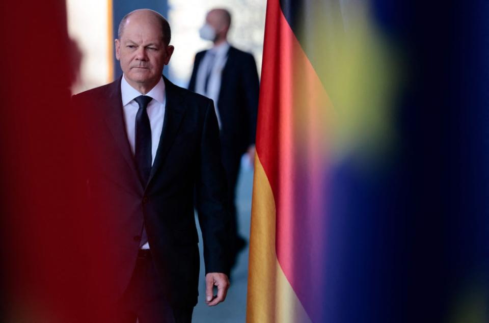 German chancellor Olaf Scholz prepares to give a statement about the killings in Bucha (AFP via Getty)
