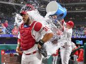 Sep 18, 2018; Philadelphia, PA, USA; Philadelphia Phillies catcher Jorge Alfaro (38) has water doused on him by catcher Wilson Ramos (40) after his three run home run helped beat the New York Mets at Citizens Bank Park. Mandatory Credit: Eric Hartline-USA TODAY Sports