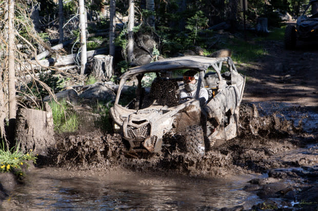 Our convoy halts when the trail is blocked by an older, smaller UTV sunk to the axles.<p>Wilderness Collective/Aaron Dorff</p>