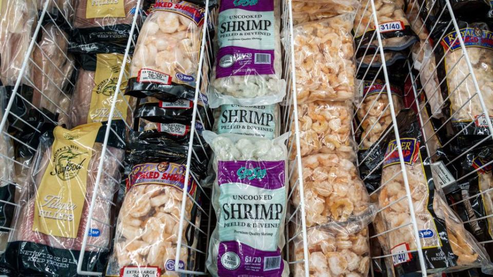 north bay village, miami, florida, presidente supermarket, frozen food aisle, seafood, uncooked and cooked shrimp, tilapia and fish