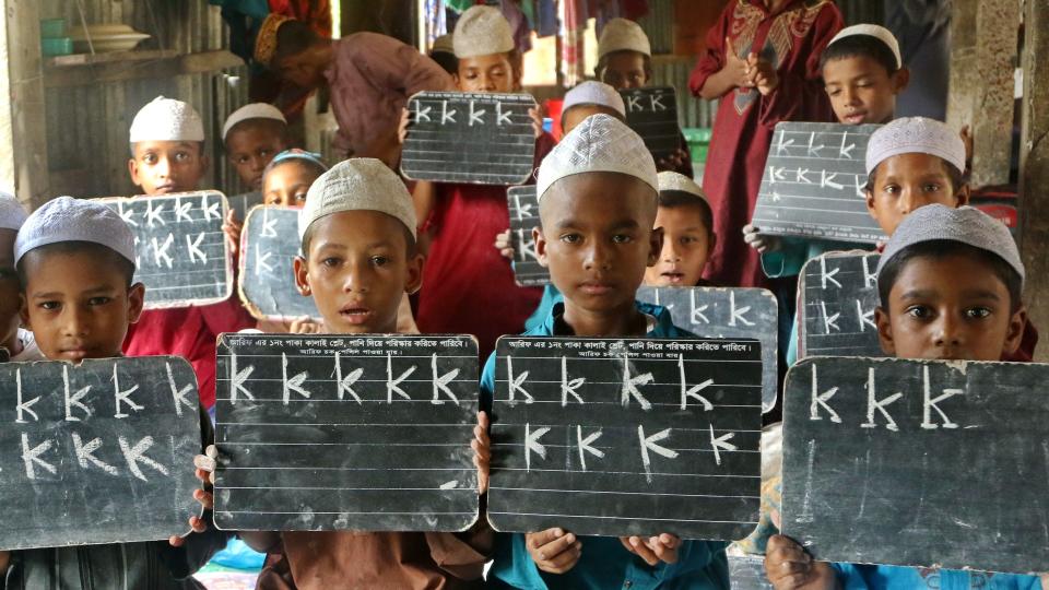 Dhaka, Bangladesh - September 8, 2015: Children attend class at a Madrassah, a traditional Islamic school in Bangladesh, in a village in Munshiganj district.