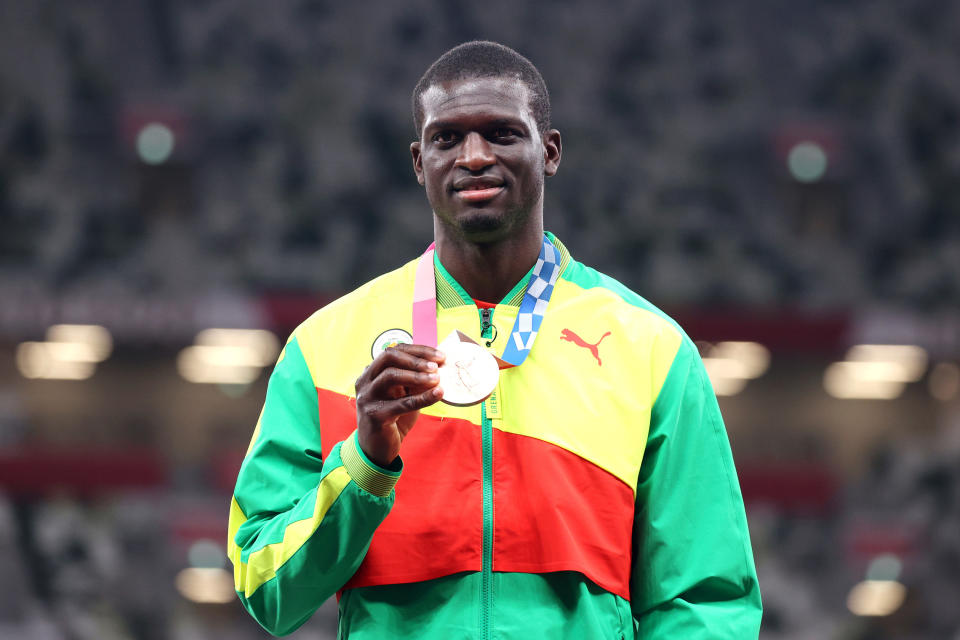 Grenada's Kirani James holds bronze medal for Men's 400m.