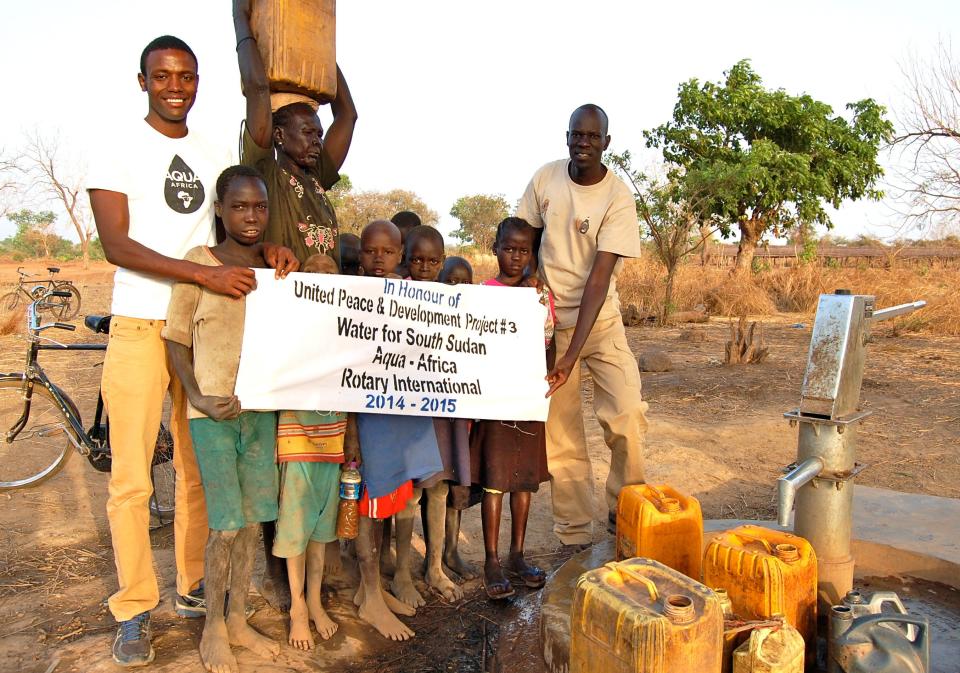 Salva Dut, right, and a new ally, Buey Ray Tut, left, dedicate a well in a village on the outskirts of Wau in South Sudan.