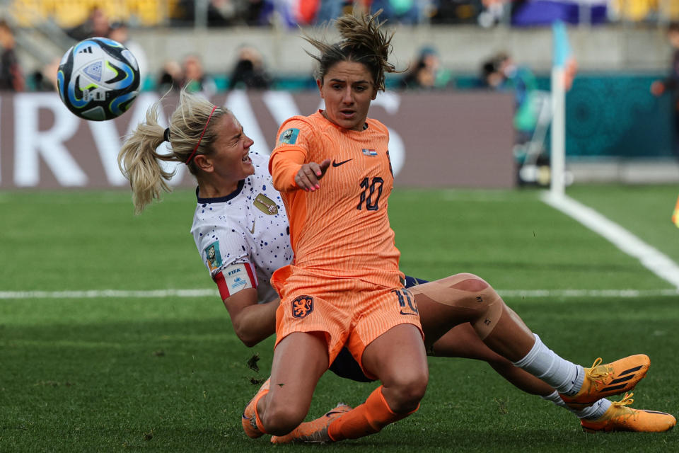 Netherlands' midfielder #10 Danielle van de Donk fights for the ball with USA's midfielder #10 Lindsey Horan during the Australia and New Zealand 2023 Women's World Cup Group E football match between the United States and the Netherlands at Wellington Stadium, also known as Sky Stadium, in Wellington on July 27, 2023. (Photo by Marty MELVILLE / AFP) (Photo by MARTY MELVILLE/AFP via Getty Images)