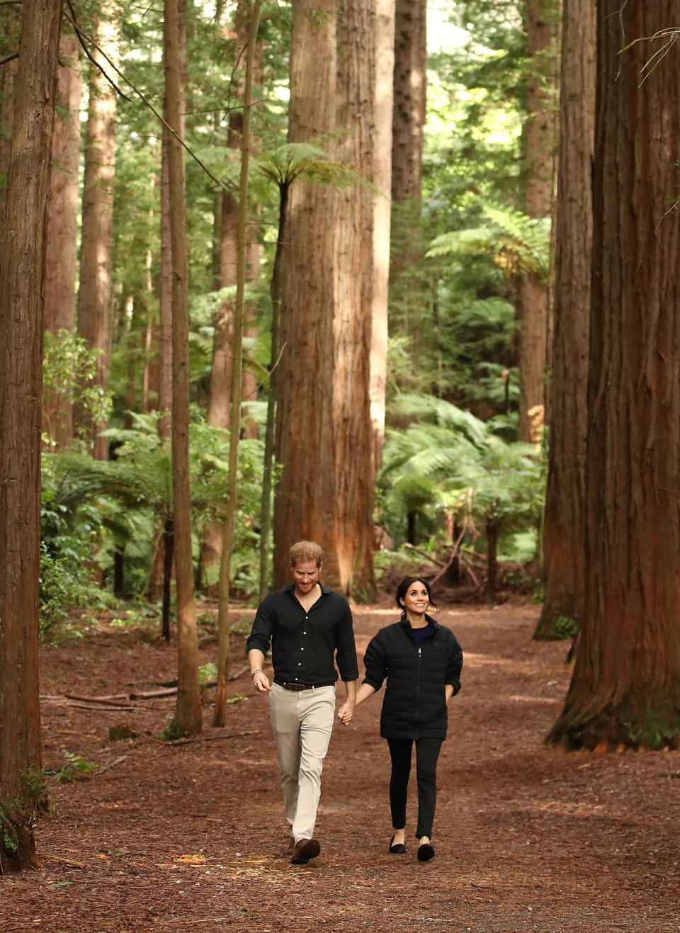 The couple capped off their visit to New Zealand with a romantic stroll through the <a rel="nofollow noopener" href="https://people.com/royals/pregnant-meghan-markle-embarks-on-suspension-bridge-walk-between-117-year-old-redwood-trees/" target="_blank" data-ylk="slk:Redwoods Treewalk Rotorua;elm:context_link;itc:0;sec:content-canvas" class="link ">Redwoods Treewalk Rotorua</a>.