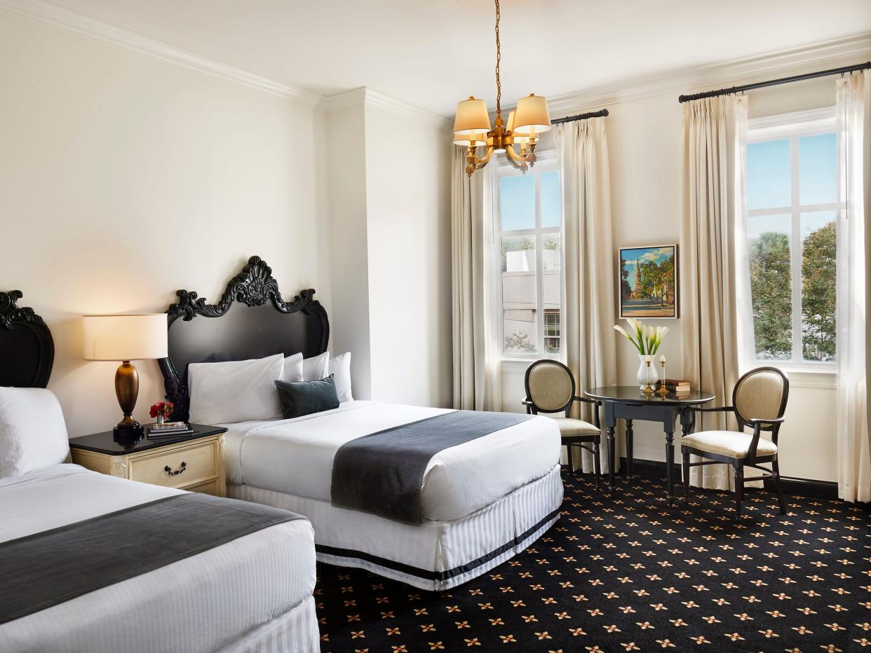 French Quarter Inn hotel King Balcony Guestroom in Charleston South Carolina CREDIT: Charlestowne Hotels