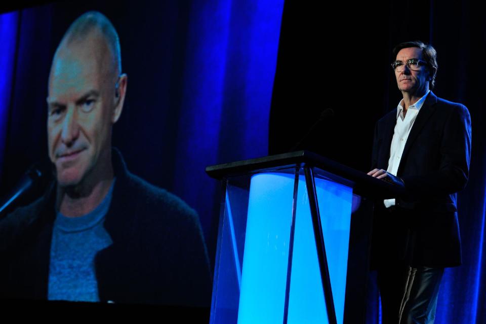 This photo provided by PBS shows, Sting, left, (via satellite) and executive-in-charge Stephen Segaller discussing the special “Sting: The Last Ship," during "PBS' Great Performances" session at the Television Critics Association Winter Press Tour in Pasadena, Calif., on Monday, January 20, 2014. The special highlights songs from the artist’s Broadway-bound show about the demise of ship-building. Sting's PBS special, "Sting: The Last Ship,’’ airs Feb. 21, 2014, on "Great Performances.’’ (AP Photo/PBS, Rahoul Ghose)