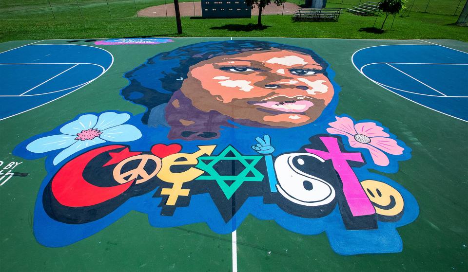 A mural of Breonna Taylor adorns the basketball court in Lannan Park in the Portland neighborhood. June 15, 2021