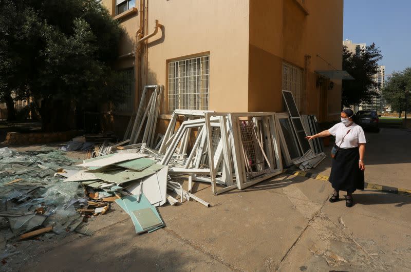 Sister Magida Fheili shows the damage at the College Notre Dame de Nazareth in Beirut