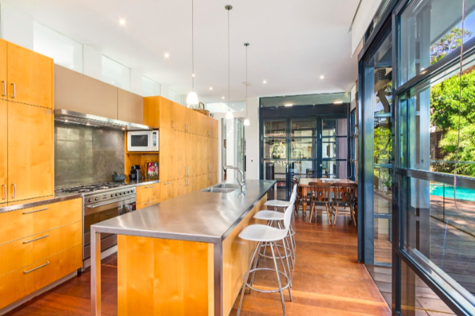 Sophisticated kitchen facilities complete with timber cabinets