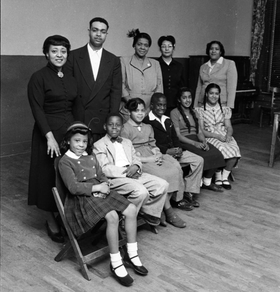 Portrait of the Black students and their parents who initiated Brown v. Board in Topeka, Kansas, 1953. Pictured are, front row from left, students Vicki Henderson, Donald Henderson, Linda Brown (for whom the suit was named), James Emanuel, Nancy Todd and Katherine Carper; back row from left, parents Zelma Henderson, Oliver Brown, Sadie Emanuel, Lucinda Todd and Lena Carper. (Photo: Carl Iwasaki via Getty Images)