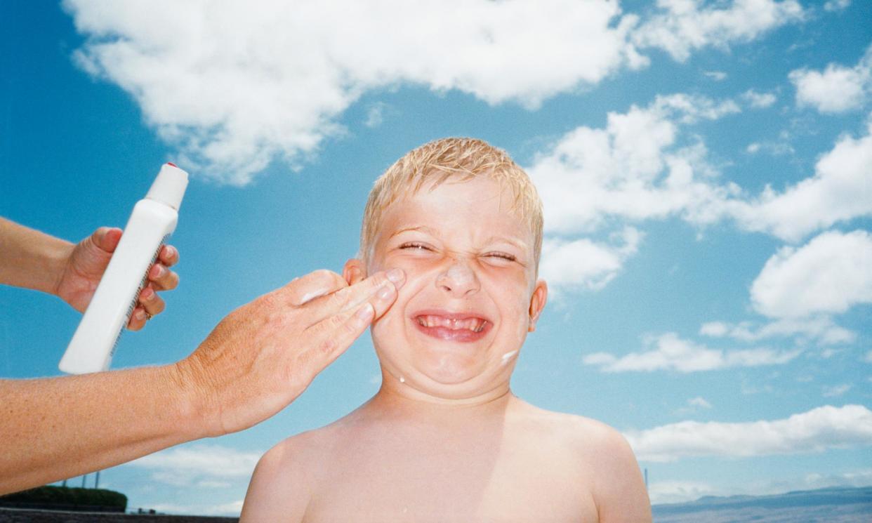 <span>A sunscreen’s SPF, or sun protection factor, indicates how much protection a product offers.</span><span>Photograph: Sean Justice/Getty Images</span>