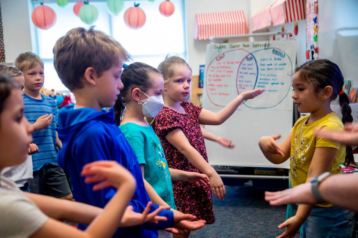 Most students in Holly Berk’s kindergarten class elected not to wear masks Monday, March 7, 2022 at Scotts Ridge Elementary in Apex. Monday marked the first day that face masks are now optional in Wake County schools.