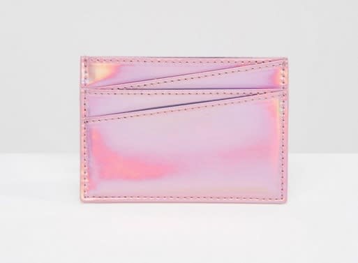 <p>Card holders are one of those things everyone should have. This metallic one amps up the style factor. <a rel="nofollow noopener" href="http://www.asos.com/monki/monki-metallic-card-holder/prd/7336383?iid=7336383&clr=Pink&SearchQuery=christmas&pgesize=36&pge=11&totalstyles=4090&gridsize=3&gridrow=3&gridcolumn=3" target="_blank" data-ylk="slk:ASOS, £5;elm:context_link;itc:0;sec:content-canvas" class="link "><i>ASOS, £5</i></a> </p>