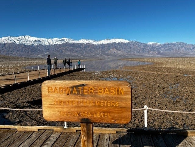 A rare temporary lake created by heavy rainfall from the remnants of Hurricane Hilary is seen in Badwater Basin in Death Valley National Park.