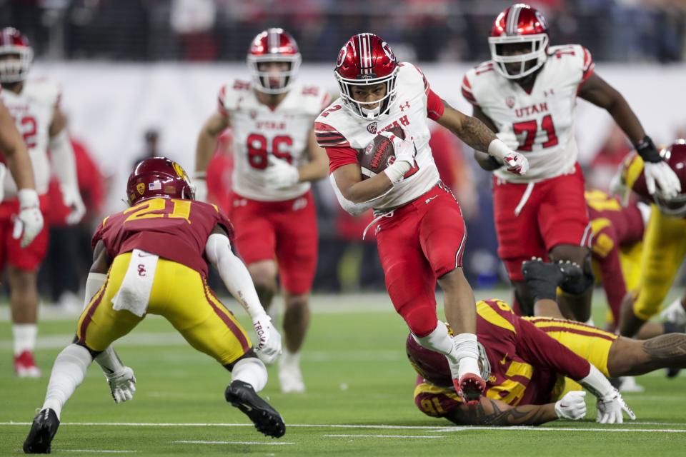 Utah’s Micah Bernard runs with the ball during game against USC in the Pac-12 championship at the Allegiant Stadium.