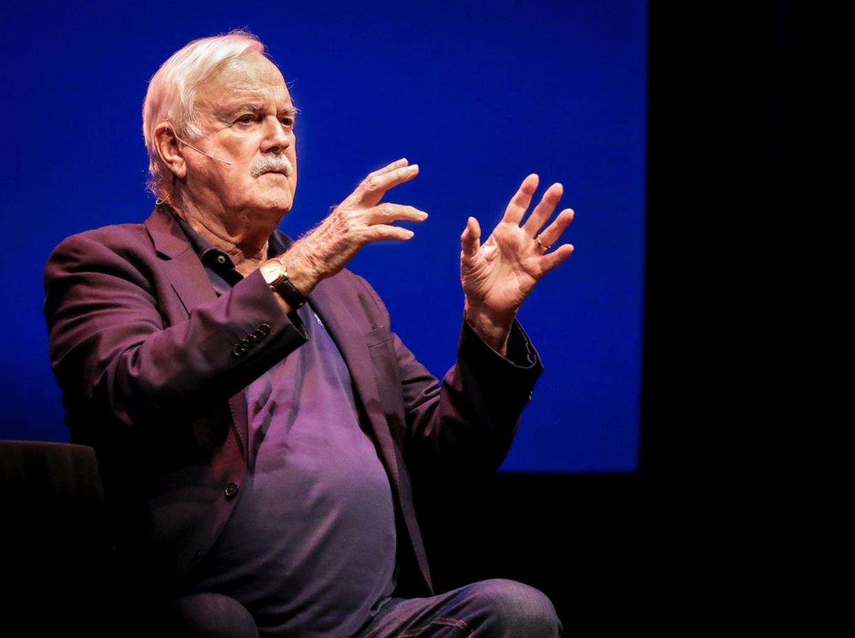 John Cleese conducts a Q&A after a showing of "Monty Python and the Holy Grail" on Feb. 15, 2020 in Worcester, Massachusets.