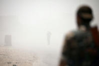 <p>Syrian Democratic Forces (SDF) fighters stand amid smoke in Raqqa’s western neighbourhood of Jazra, Syria June 11, 2017. (Photo: Rodi Said/Reuters) </p>