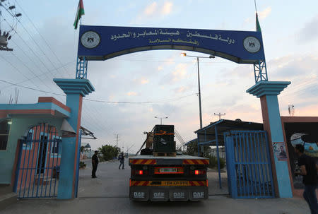 A truck loaded with crates containing animals leaves Gaza after being evacuated by Four Paws International, at Erez Crossing between Israel and northern Gaza Strip August 24, 2016. REUTERS/Ibraheem Abu Mustafa