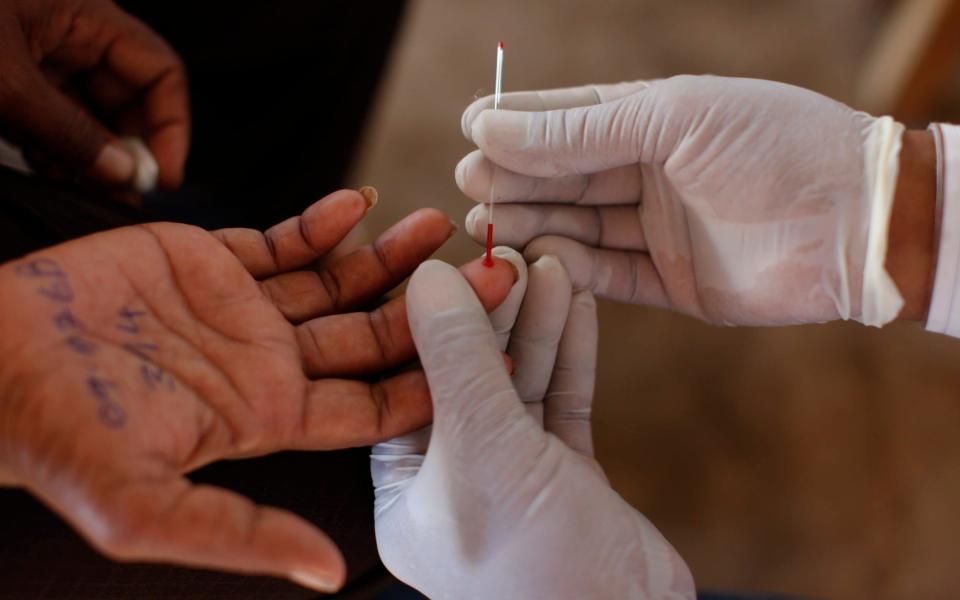 Malaria testing in Cambodia, led by the WHO - Paula Bronstein/Getty Images
