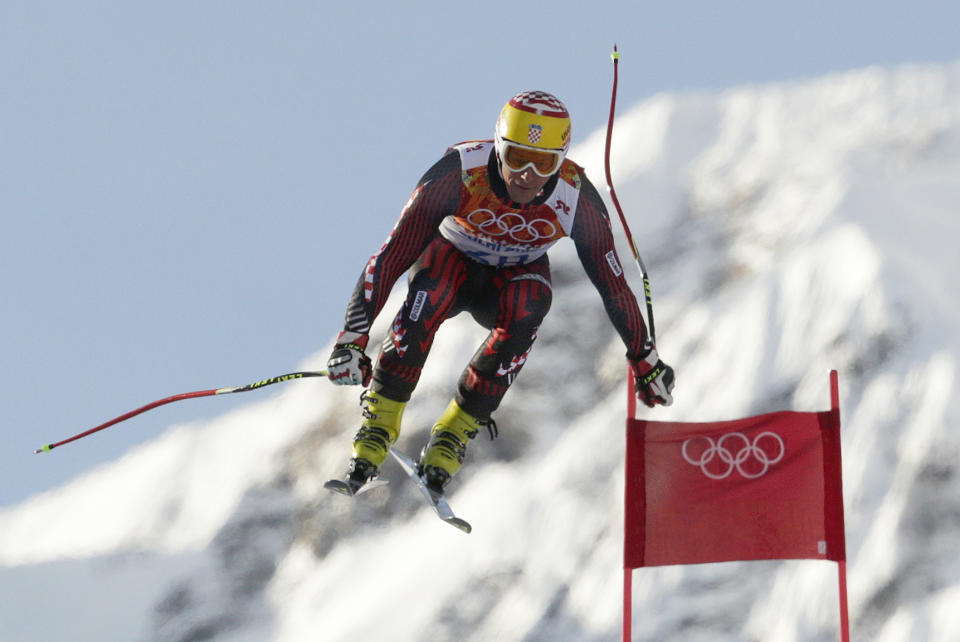 Croatia's Ivica Kostelic makes a jump during a men's downhill training run for the Sochi 2014 Winter Olympics, Friday, Feb. 7, 2014, in Krasnaya Polyana, Russia. (AP Photo/Charles Krupa)