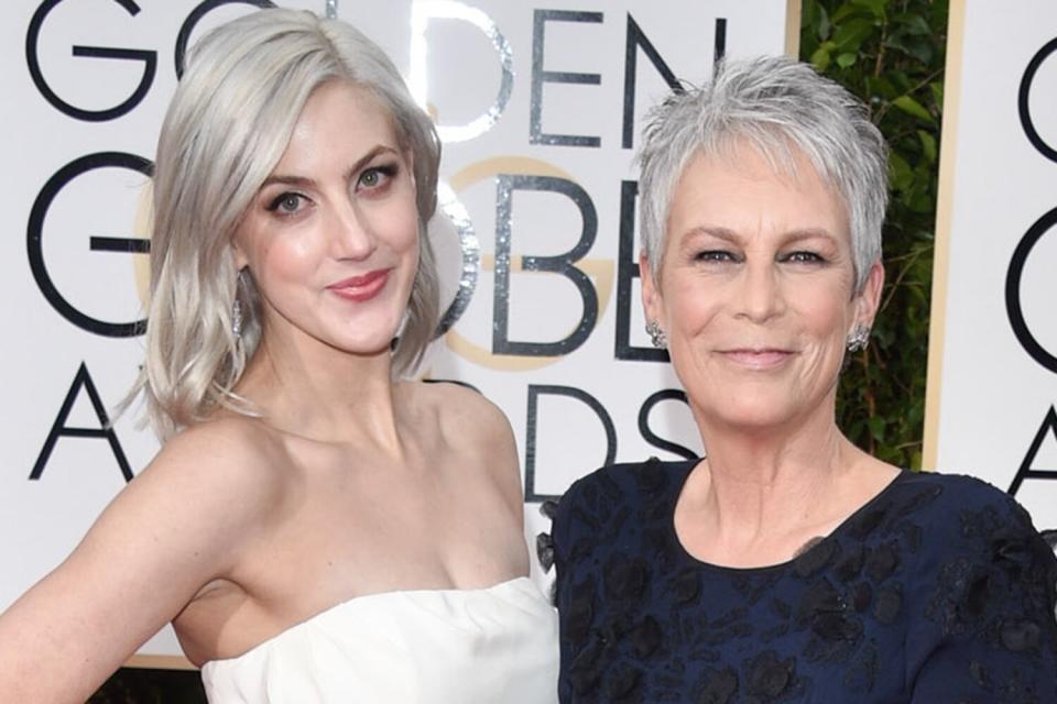 Actress Jamie Lee Curtis (R) and Annie Guest attend the 73rd Annual Golden Globe Awards held at the Beverly Hilton Hotel on January 10, 2016 in Beverly Hills, California.