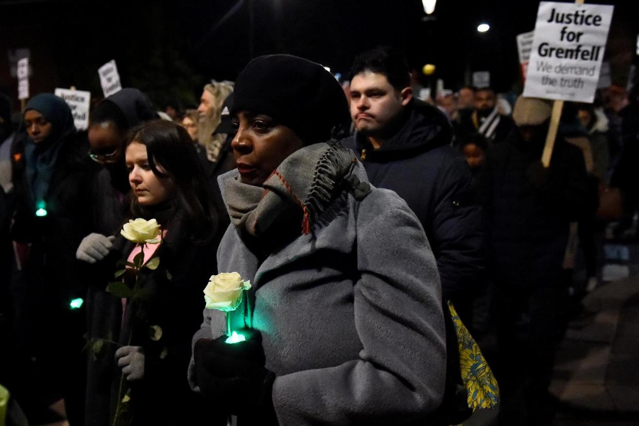 The silent candlelit march marked the six month anniversary of the Grenfell Tower fire: REUTERS