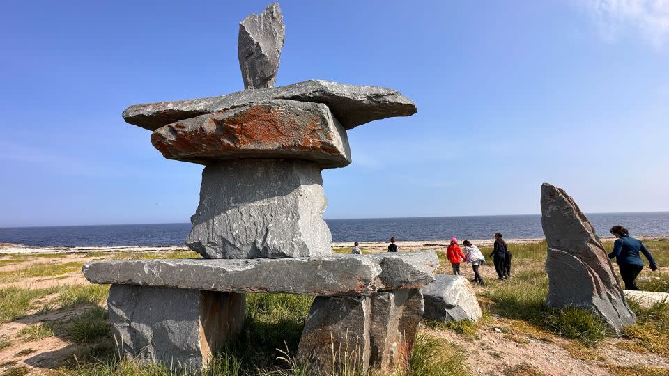 An Inukshuk, a structure of boulders piled to look like a person, fronts Churchill’s city beach. - Terry Ward