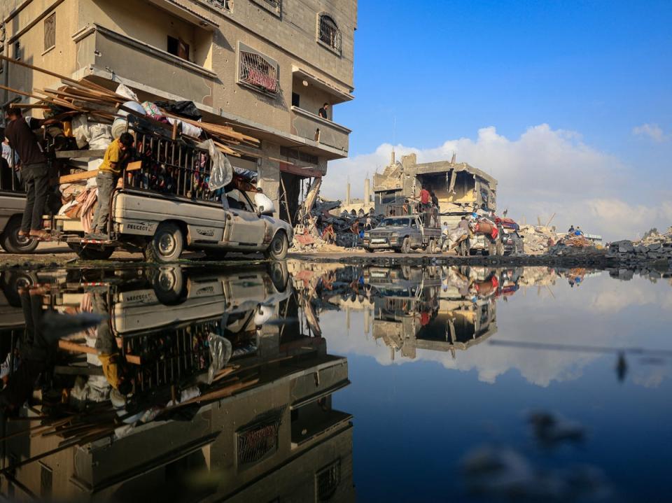 Displaced Palestinians from areas in east Khan Yunis arrive in the city as they flee after the Israeli army issued a new evacuation order for parts of the city and Rafah, in the southern Gaza Strip on 2 July 2024, amid the ongoing conflict between Israel and the Palestinian Hamas militant group (AFP via Getty Images)