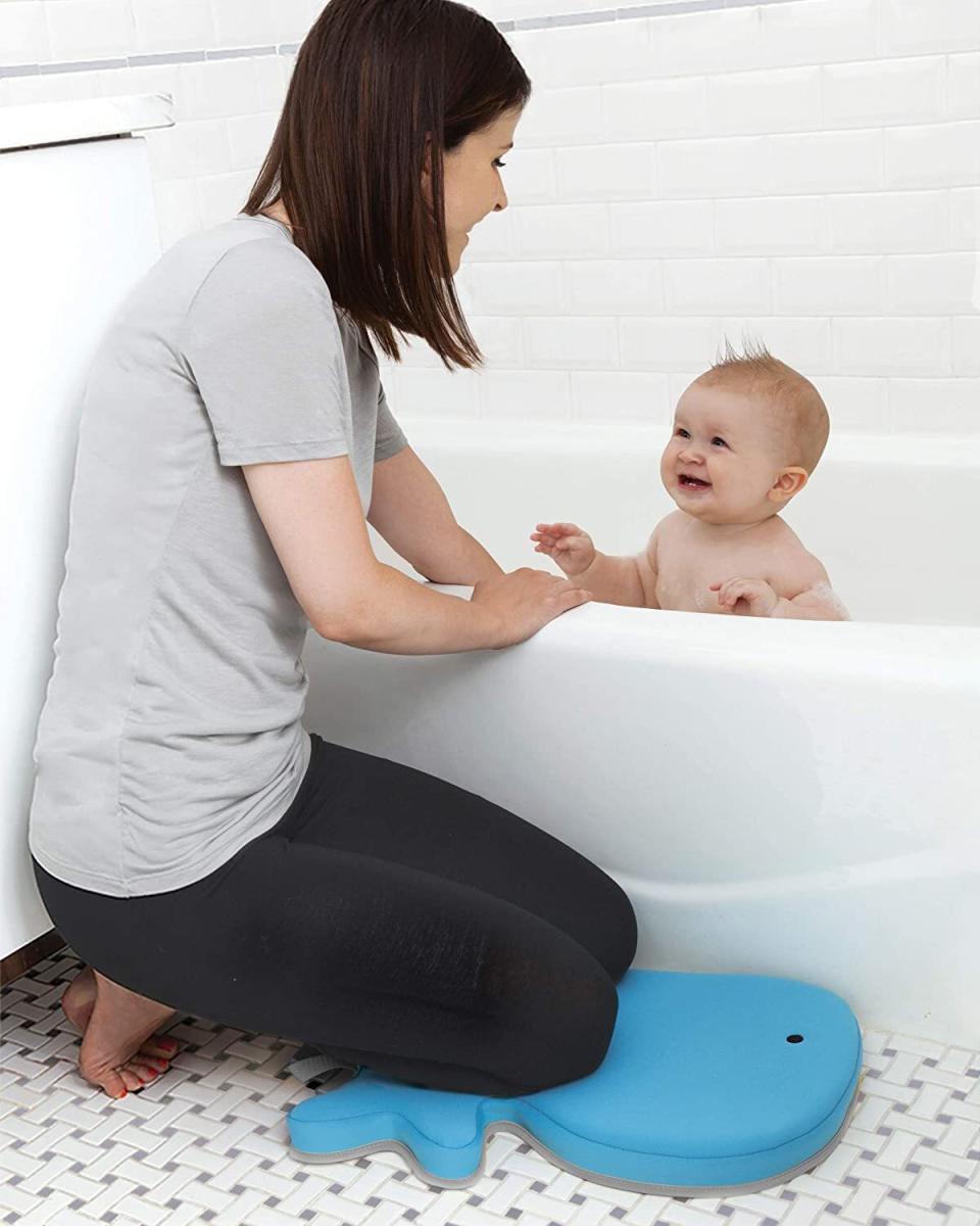 Unless you're getting in the tub, you're going to be praying (you're basically already in that position) for some support for your patellas. That bathroom floor is unforgiving, but this product will save you. <br /><br /><strong>Promising review:</strong> "Soooo, this is Mr. Whale, at least that's what he's called in our house. My knees and I love him so much that I've even started to sing a song about him every night at bath time (come to think of it, it's more of a sea shanty). And it goes a little something like this: 'He's Mr. Whale, he's Mr. Whale. He's got a tail(tale)...to telllllllll / When you set sail, please do not fail, to say hellllllllooooo!' It's just my little way of thanking him for his consistent quiet service in offering just the right amount of cushiness so I don't have to make that 'old-man-getting-up' noise every time I've finished bathing my child." &mdash; <a href="https://www.buzzfeed.com/jmihaly" target="_blank" rel="noopener noreferrer">John Mihaly</a><br /><br /><strong>Get it from Amazon for <a href="https://amzn.to/3e4zqlw" target="_blank" rel="nofollow noopener noreferrer" data-skimlinks-tracking="5669346" data-vars-affiliate="Amazon" data-vars-asin="B005UND06I" data-vars-href="https://www.amazon.com/dp/B005UND06I?tag=bfjohn-20&amp;ascsubtag=5669346%2C7%2C22%2Cmobile_web%2C0%2C0%2C7256004" data-vars-keywords="cleaning" data-vars-link-id="7256004" data-vars-price="" data-vars-product-id="16639285" data-vars-product-img="https://m.media-amazon.com/images/I/41bL+ckge7L.jpg" data-vars-product-title="Skip Hop Moby Baby Bath Kneeler Pad, Blue" data-vars-retailers="Amazon">$14.99</a>.</strong>