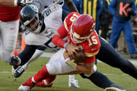 Kansas City Chiefs' Patrick Mahomes (15) runs for a touchdown against Tennessee Titans defensive tackle DaQuan Jones (90) during the first half of the NFL AFC Championship football game Sunday, Jan. 19, 2020, in Kansas City, MO. (AP Photo/Ed Zurga)