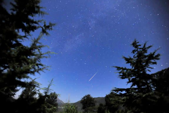 A Perseid meteor streaks above China in 2009.