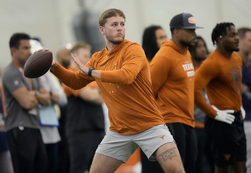 Texas quarterback Quinn Ewers threw to NFL hopefuls at UT's pro timing day at Denius Fields on Wednesday. Scouts took notice of his accuracy on passes to former teammates Xavier Worthy, Adonai Mitchell, Jordan Whittington, Ja'Tavion Sanders and Keilan Robinson.