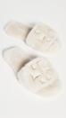 <p>Because no one can deny soft and comfortable slippers, enhance someone's self-care routine with these <span>Tory Burch Double T Shearling Slides</span> ($167, plus 30 percent off with code HOLIDAY). The designer adds a touch of cool, while the overall look makes you want to pet it.</p>