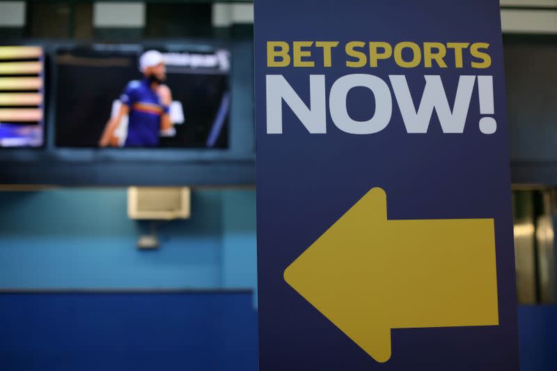 A sign is seen at Monmouth Park Sports Book by William Hill ahead of the opening of the first day of legal betting on sports in Oceanport New Jersey