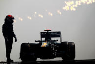 Heikki Kovalainen of Finland and Caterham stands beside his car after its engine blew up in the tunnel during practice for the Monaco Formula One Grand Prix at the Monte Carlo Circuit on May 24, 2012 in Monte Carlo, Monaco. (Paul Gilham/Getty Images)