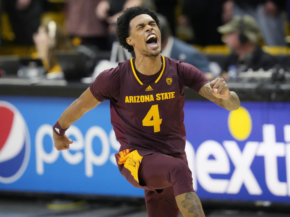 Arizona State guard Desmond Cambridge Jr. celebrates after hitting the winning 3-point basket against Colorado in the second half of an NCAA college basketball game Thursday, Dec. 1, 2022, in Boulder, Colo. (AP Photo/David Zalubowski)