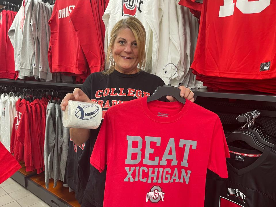 Kelly Dawes, the owner of College Traditions retail store in Columbus, Ohio, says home game weekends are like Christmas for the town.