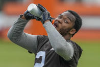 Cleveland Browns' Amari Cooper takes a drink during drills at team's NFL football training camp, Saturday, July 22, 2023, in White Sulphur Springs, W.Va. (AP Photo/Chris Carlson)